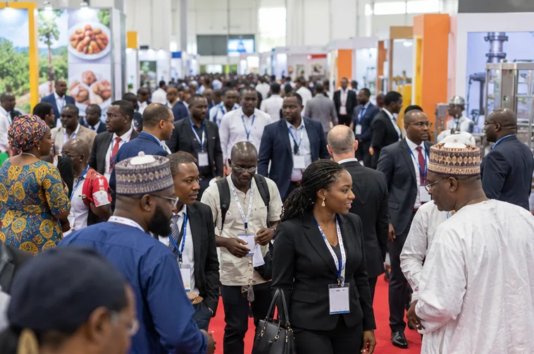 Visitors network in a busy technology exhibition hall